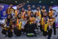 Kontinjen negara yang mengharumkan nama Malaysia di Sukan Komanwel Glasgow 2026 selamat tiba di Lapangan Terbang Antarabangsa Kuala Lumpur (KLIA) pada Selasa. Foto: Bernama 