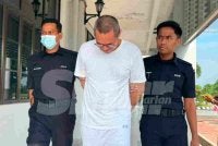 Md Ilyas Syahmi dibawa keluar dari Mahkamah Tinggi Sungai Petani.