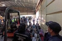 Antara warga Indonesia yang ditahan dalam operasi JPN di sebuah kilang di Klang pada Khamis. Foto: JPN