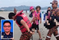 Kedua-dua remaja dikhuatiri hilang ketika mandi Pantai Tanjung Badak, Tuaran ditemukan pasukan bomba ketika operasi SAR dilakukan. Gambar kecil: Kurong