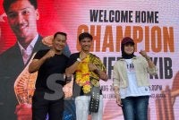 Aliff Rakib (tengah) memasang impian untuk bergelar juara sebenar dengan membawa pulang satu lagi tali pinggang. Foto SINAR HARIAN/HAZELEN LIANA KAMARUDIN
