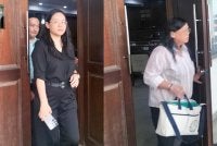Karen Lo (kiri) dan Lim Hoou Cheng mengaku tidak bersalah ke atas pertuduhan atas tujuh pertuduhan gagal menjelaskan cukai perkhidmatan dan penalti berjumlah RM193,306.28.