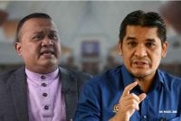 Mohd Radzi (gambar kanan) menegur Mohd Sany menerusi hantaran di Facebook pada Selasa.