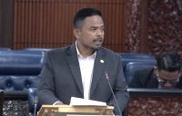 Manndzri ketika sidang khas pembentangan RCI berhubung Lembaga TH di Dewan Rakyat, di sini pada Selasa.