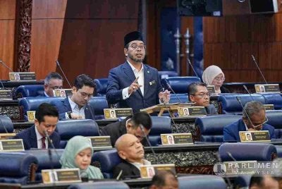 Zulkifli ketika menyampaikan penerangan pada sesi khas Dewan Rakyat bagi membahaskan laporan RCI TH, pada Selasa. Foto Jabatan Penerangan