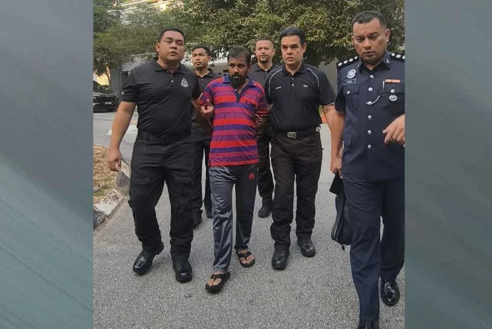Md Idris dibawa polis ke Mahkamah Seremban pada Rabu.