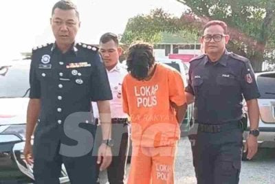 Vishwesh (tengah) dibawa ke Mahkamah Majistret Telok Datok, Kuala Langat bagi menghadapi pertuduhan kes jenayah.