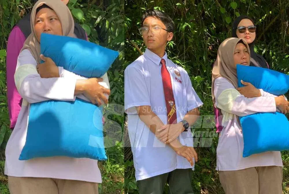 Norhasmiza memeluk 'bantal busuk' milik anak lelaki tunggalnya, Muhamad Rayyan dan berdoa agar dia ditemukan hari ini.