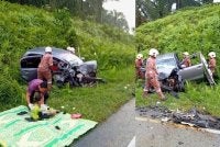 Anggota bomba mengeluarkan mangsa yang tersepit untuk menerima rawatan.