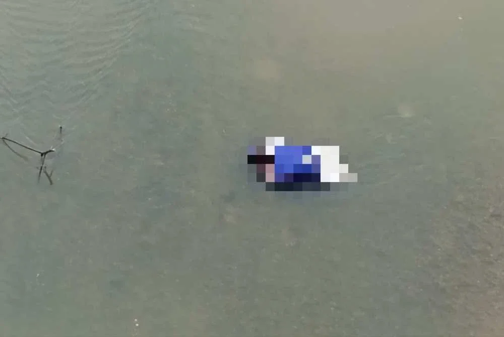 Mayat wanita yang ditemui dalam beg di tengah Sungai Perak.