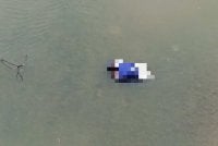 Mayat wanita yang ditemui dalam beg di tengah Sungai Perak. 