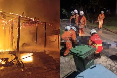 Anggota bomba mengangkat jenazah mangsa sebelum diserahkan kepada polis untuk tindakan lanjut. Foto: Polis Rompin