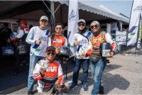 Penunggang motosikal gembira menerima MYRIDERID secara percuma sempena majlis pelancarannya di Stadium Negeri Pulau Pinang, Batu Kawan pada Ahad.