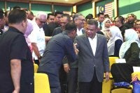 Saifuddin Nasution hadir pada Perhimpunan Bulanan KDN Bagi Bulan Ogos di Auditorium Setia Perkasa pada Selasa. Foto Bernama