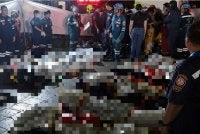 Mangsa korban di pub Rong Beer Na Lat Phrao di daerah Chatuchak, utara Bangkok, sejurus sebelum tengah malam pada 13 Julai lalu. - Gambar fail Agensi