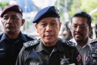 Mohd Khalid bercakap kepada pemberita selepas Majlis Penyerahan Aset All Terrain Tactical Assault E-Bike (ATEB) JEBATT F29 kepada Pasukan Gerakan Am (PGA) di Ibu Pejabat PDRM Bukit Aman pada Rabu. Foto Bernama 