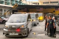 Kenderaan membawa jenazah tiga sekeluarga yang maut dalam kemalangan keluar dari IPFN HKL pada Rabu.