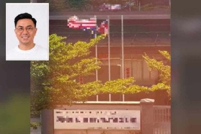 Jalur Gemilang dan bendera negeri Johor dipasang terbalik di sebuah premis sehingga mengundang kemarahan orang ramai. Gambar kecil: Zulkifli