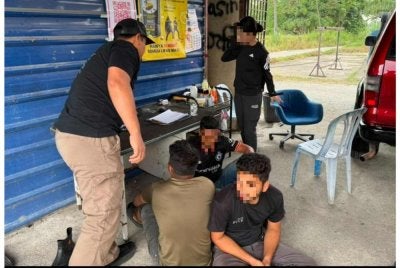 Antara warga asing yang diperiksa dalam operasi JIM Selangor di Kajang pada Rabu.