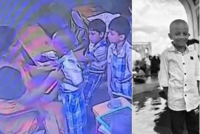 Rakaman CCTV di dalam kelas menunjukkan kanak-kanak itu memegang batu tulis sebelum berdiri dalam barisan di hadapan gurunya. - Foto Agensi