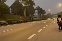 Aksi motosikal berlumba di Lebuhraya Linkedua. - Foto tular