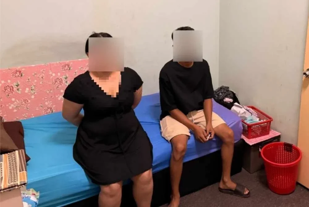 Antara warga asing yang ditahan dalam serbuan JIM di Seremban pada Ahad.