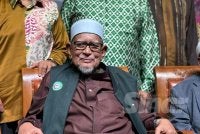 Abdul Hadi ketika ditemui pada Majlis Makan Malam Amal Negeri Melaka di sebuah hotel malam Ahad. 