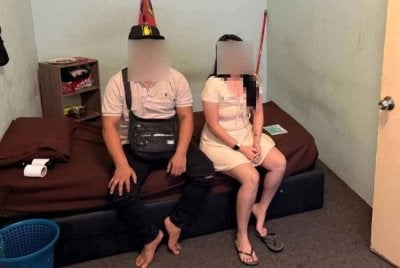 Antara warga asing yang ditahan dalam serbuan JIM di Seremban pada Ahad.