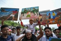Pelarian Rohingya berhimpun menyertai demonstrasi bagi memperingati ulang tahun kesembilan penghijrahan besar-besaran mereka di Cox’s Bazar, Bangladesh. FOTO: AFP