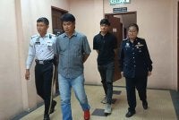 Kedua-dua tertuduh ketika hadir di Mahkamah Tawau pada Rabu.