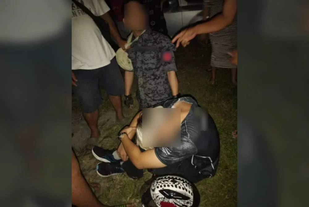 Dua lelaki ditahan selepas menyamar sebagai anggota penguat kuasa dan memerap warga asing dalam kejadian di Kampung Koidupan Sugud, Penampang.