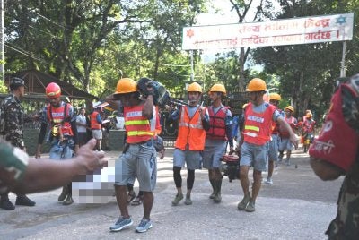 Angka kematian akibat banjir kilat di Nepal meningkat kepada 472 orang pada Jumaat. Foto AFP