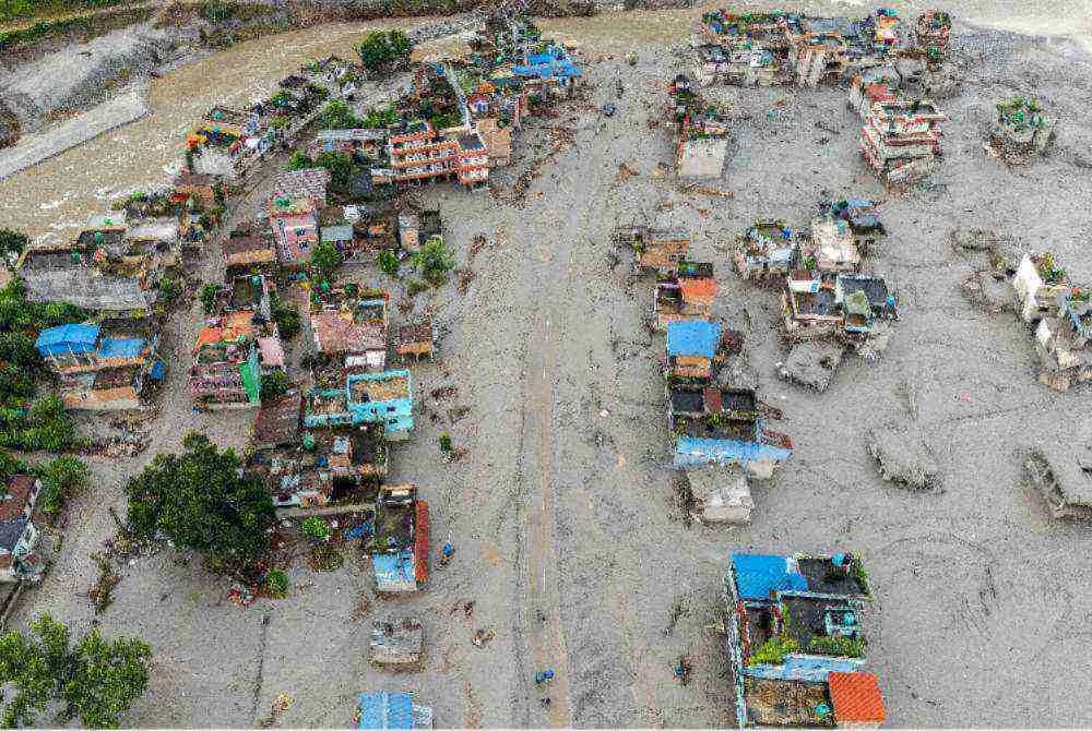 Gambar udara yang diambil hari ini menunjukkan kesan kejadian banjir di daerah Nuwakot, Nepal. Foto: MANAN VATSYAYANA / AFP