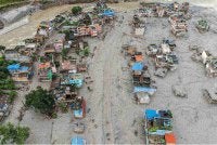 Gambar udara yang diambil hari ini menunjukkan kesan kejadian banjir di daerah Nuwakot, Nepal. Foto: MANAN VATSYAYANA / AFP