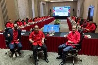 Hajiji (tengah) ketika mempengerusikan mesyuarat AMT Gagasan Rakyat di SICC, Kota Kinabalu.