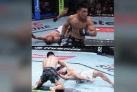 Umar rebah setelah terkena tumbukan tepat Yadong sehingga memaksa pengadil menghentikan pertarungan pada minit 1:48s pusingan kedua. Foto: Agensi.