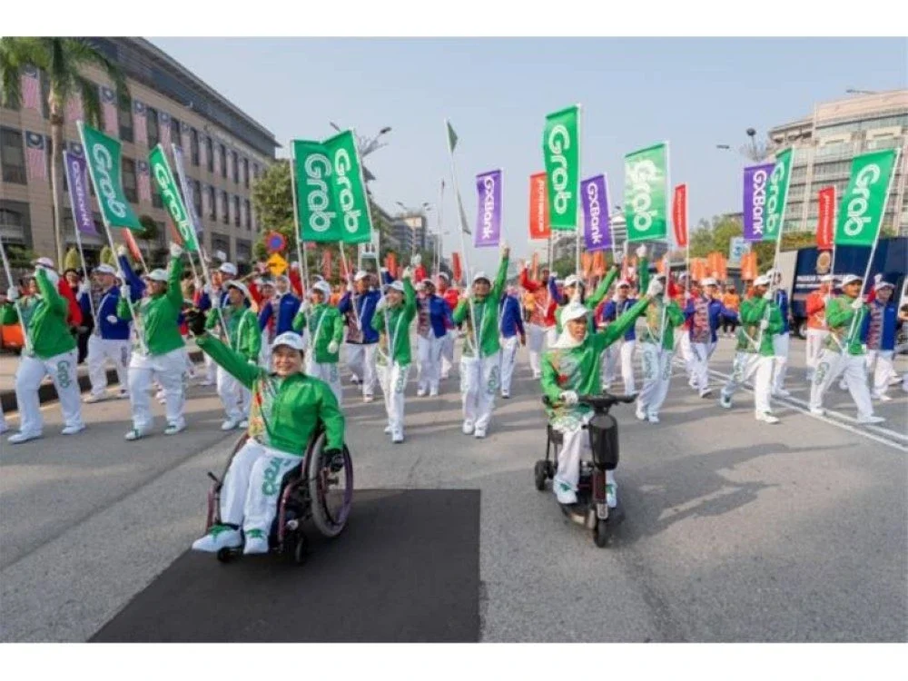 Pasukan perarakan Hari Kebangsaan 2026 Grab Malaysia bangga dapat bersama menjayakan sambutan tahun ini.