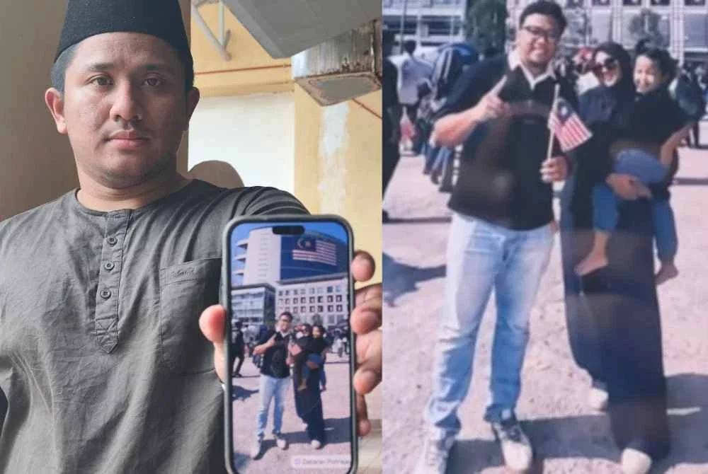 Mohd Hafiz menunjukkan gambar kenangan arwah adiknya bersama keluarga ketika menyambut hari kebangsaan di Putrajaya.