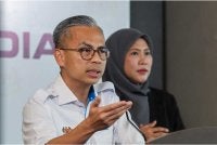 Fahmi bercakap pada sidang media mingguan Kabinet di Menara Komunikasi, Putrajaya pada Rabu. - FOTO: Bernama