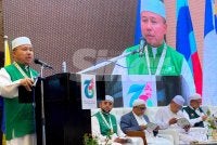 Ahmad menyampaikan ucapan pada Muktamar Tahunan Dewan Ulama Pas Pusat Kali Ke-65 di Kota Bharu pada Khamis. Foto: HAZELEN LIANA KAMARUDIN