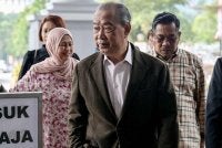 Muhyiddin hadir di Mahkamah Tinggi pada Khamis bagi perbicaraan tujuh pertuduhan menyalahgunakan kedudukan dan pengubahan wang haram. Foto Bernama