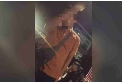 Tangkap layar rakaman video tular memaparkan lelaki yang disyaki mencetuskan provokasi di Dataran Putrajaya, pada Isnin.