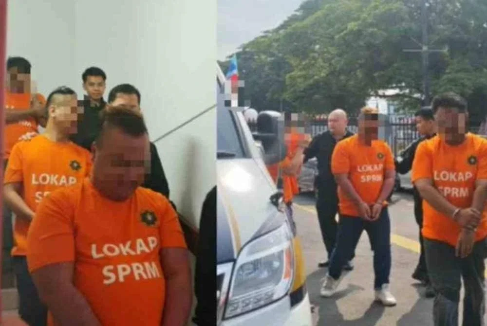 Tahanan SPRM sebelum ini dipakaikan baju oren ketika dibawa ke mahkamah untuk reman. Gambar hiasan