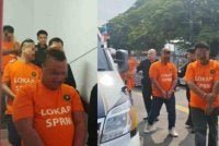 Tahanan SPRM sebelum ini dipakaikan baju oren ketika dibawa ke mahkamah untuk reman. Gambar hiasan