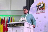 Afnan Hamimi ketika menyampaikan ucapan penggulungan pada Muktamar Tahunan Pas Kali Ke-72 di PUTIK, Pengkalan Chepa, Kota Bharu pada Sabtu.