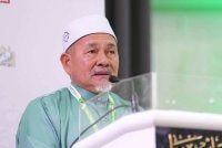 Tuan Ibrahim menyampaikan ucapan penggulungan pada Muktamar Tahunan Pas Kali Ke-72 di Pusat Tarbiah Islamiah Kelantan (PUTIK), Pengkalan Chepa di sini pada Sabtu.
