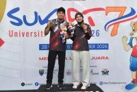 Sayyeda (kanan) dan Syafiq membaharui rekod kebangsaan dalam aksi final acara 10m pistol angin berpasukan campuran SUKIPT 2026 di UPNM, Sungai Besi pada Sabtu. Foto SUKIPT