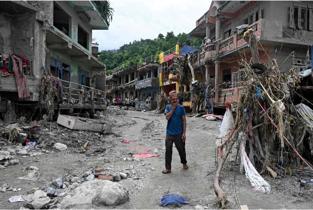 Keadaan selepas dilanda banjir lumpur. Foto Agensi