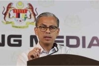 Fahmi Fadzil bercakap pada sidang akhbar mingguan Kabinet di Menara Komunikasi hari ini. - Foto: Bernama