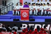 Mohamad Hasan berucap pada Perasmian Perhimpunan Agung Pergerakan Sayap Wanita, Pemuda dan Puteri UMNO sempena Perhimpunan Agung UMNO 2026 di Dewan Merdeka, Pusat Dagangan Dunia Kuala Lumpur hari ini. - Foto: Bernama